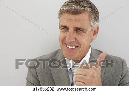 Stock Image - Positive businessman. Fotosearch