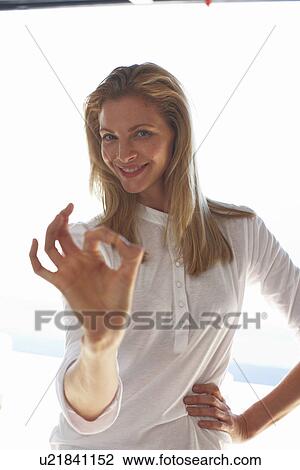 Stock Image - Positive young woman. Fotosearch