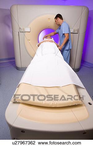 Preparing for a ct scan View Large Photo Image Stock Image - Preparing for a ct scan. Fotosearch