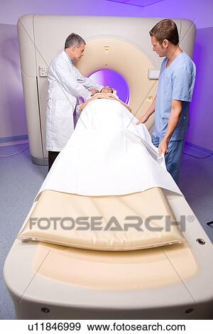 Stock Photo - Preparing for a ct scan. Fotosearch