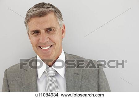 Relaxed and happy executive View Large Photo Image Picture - Relaxed and happy executive. Fotosearch