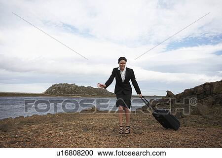 Stock Image - Sad girl in the middle of nowhere. Fotosearch