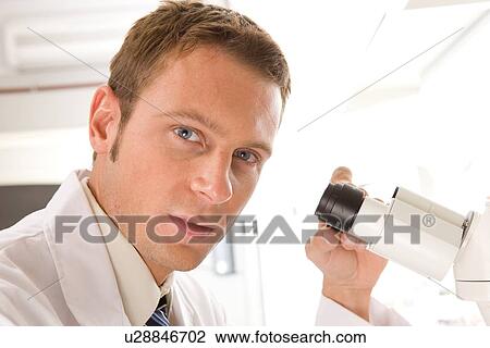 Stock Image - Scientist at work. Fotosearch