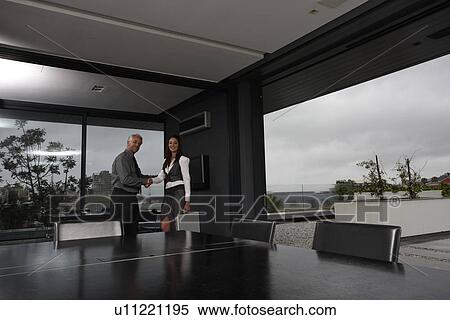 Stock Photography - Sealing a deal. Fotosearch