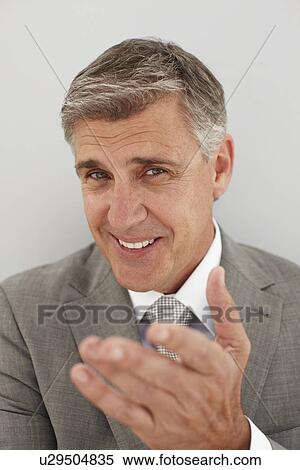Stock Photography - Senior businessman expression. Fotosearch