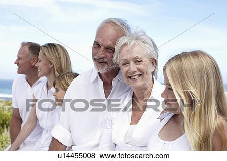 Stock Photo - Senior couple with family. Fotosearch