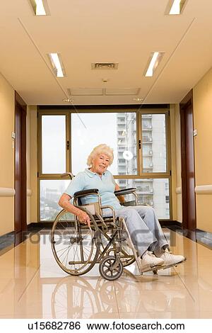 Stock Photograph - Senior in a wheelchair. Fotosearch