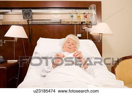 Senior woman taking pills View Large Photo Image Picture - Senior woman taking pills. Fotosearch