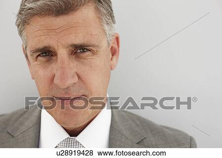 Stock Photo - Serious executive. Fotosearch