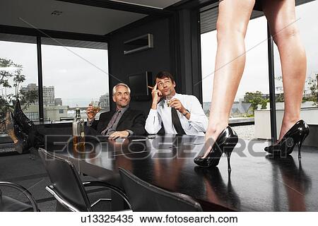 Stock Photography - Sexual harassment at work. Fotosearch