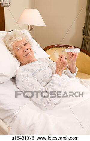Sick elderly woman View Large Photo Image Stock Photograph - Sick elderly woman. Fotosearch