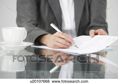 Stock Photo - Signing a contract. Fotosearch