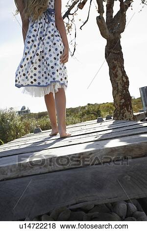 Stock Photo - Small girl walking. Fotosearch