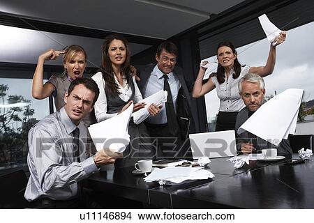 Stressed business team View Large Photo Image Picture - Stressed business team. Fotosearch