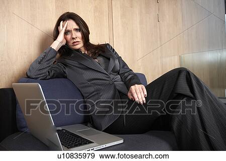 Stock Photo - Stressed business woman. Fotosearch