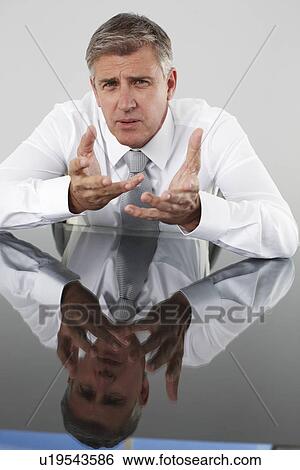 Stressed businessman View Large Photo Image Stock Photograph - Stressed businessman. Fotosearch