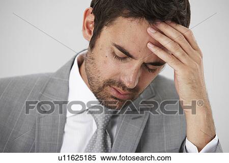 Stock Photography - Stressed young man. Fotosearch