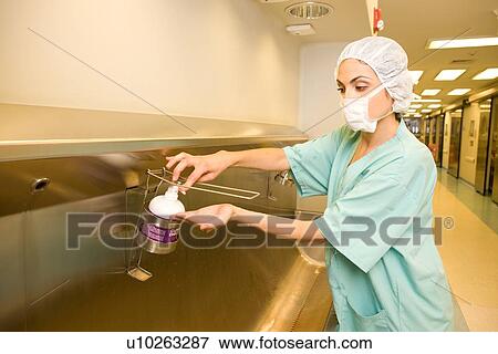 Stock Photo - Surgeon washing hands. Fotosearch