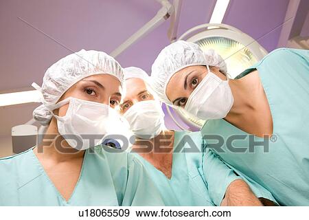 Stock Photo - Surgeons at work. Fotosearch