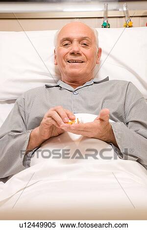 Taking medicine View Large Photo Image Stock Photography - Taking medicine. Fotosearch