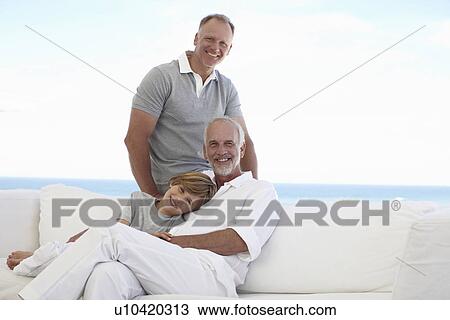 Stock Image - Three happy men. Fotosearch