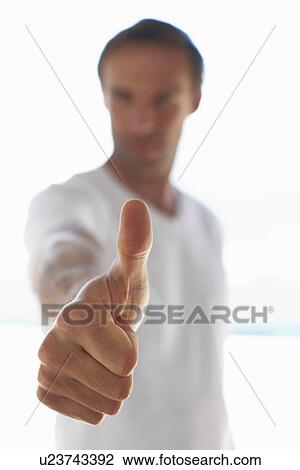 Stock Image - Thumb up. Fotosearch