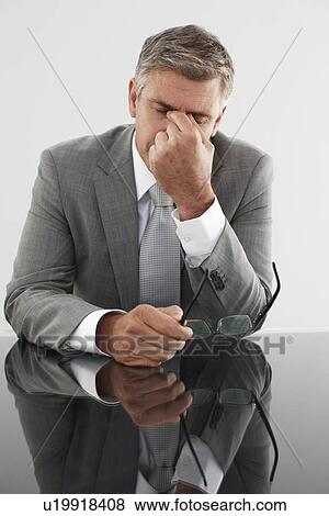 Tired executive View Large Photo Image Stock Photo - Tired executive. Fotosearch