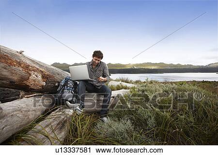Tourist paying online View Large Photo Image Stock Image - Tourist paying online. Fotosearch