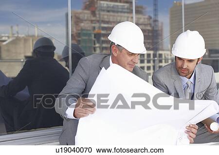 Two architects at work View Large Photo Image Stock Image - Two architects at work. Fotosearch