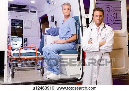 Stock Image - Two confident paramedics. Fotosearch