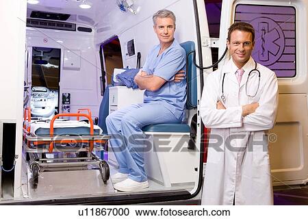 Two happy paramedics View Large Photo Image Stock Image - Two happy paramedics. Fotosearch