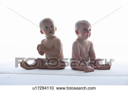 Two newborns View Large Photo Image Stock Image - Two newborns. Fotosearch
