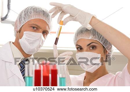 Picture - Two young scientists. Fotosearch