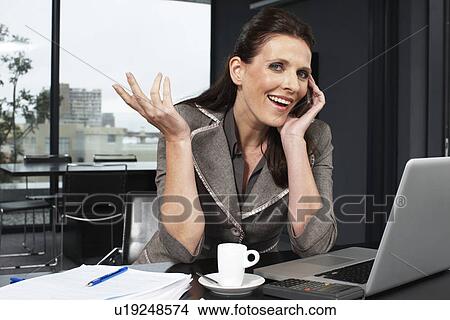 Picture - Woman at work. Fotosearch