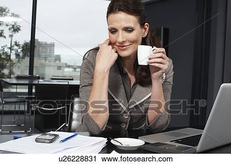 Woman at work View Large Photo Image Stock Image - Woman at work. Fotosearch