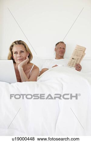 Woman using computer View Large Photo Image Stock Photo - Woman using computer. Fotosearch