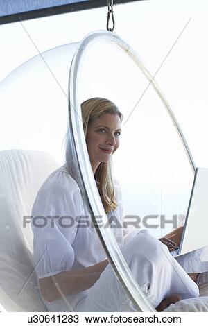 Woman with a computer View Large Photo Image Stock Image - Woman with a computer. Fotosearch