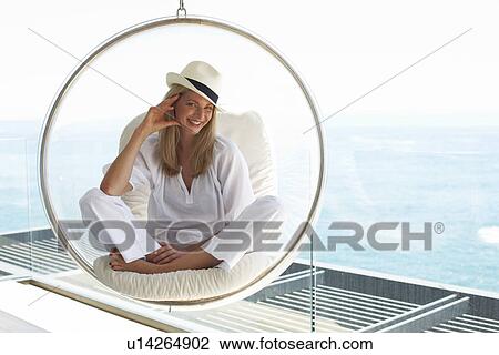 Woman with a hat View Large Photo Image Stock Image - Woman with a hat. Fotosearch