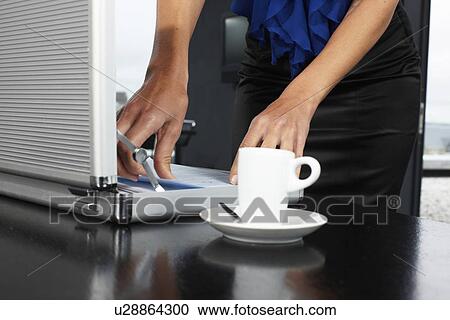 Woman with a suit case View Large Photo Image Stock Image - Woman with a suit case. Fotosearch
