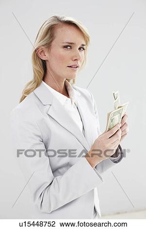 Woman with dollar notes View Large Photo Image Stock Image - Woman with dollar notes. Fotosearch