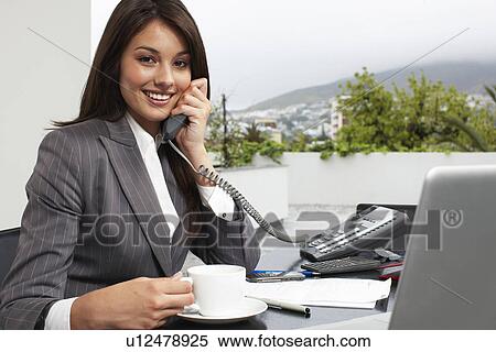 Stock Photography - Young business woman. Fotosearch