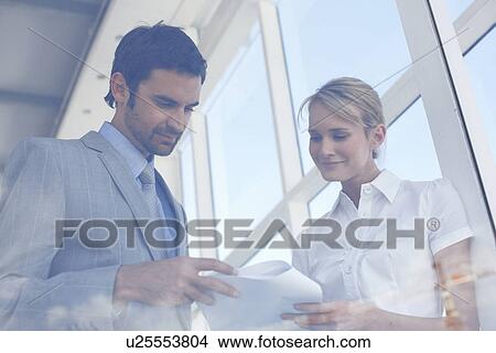 Young colleagues at work View Large Photo Image Picture - Young colleagues at work. Fotosearch