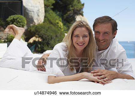 Stock Photograph - Young couple on holidays. Fotosearch