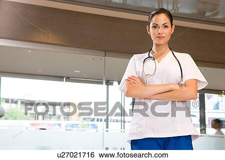 Young doctor at work View Large Photo Image Stock Photograph - Young doctor at work. Fotosearch