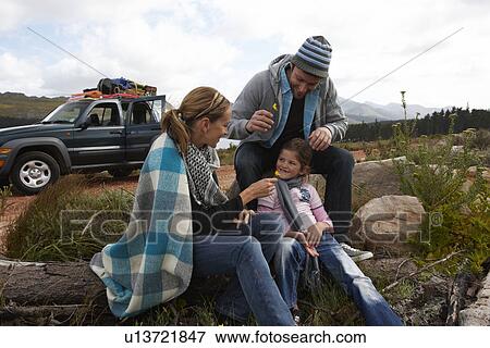 Young family on a road trip View Large Photo Image Stock Photo - Young family on a road trip. Fotosearch