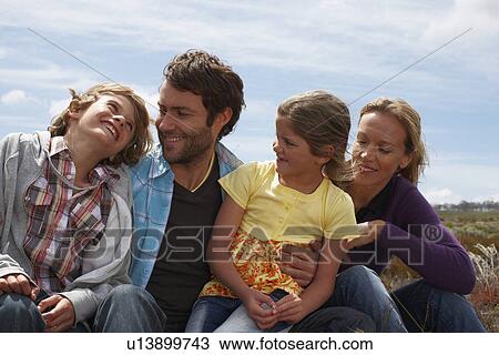 Stock Image - Young family portrait. Fotosearch
