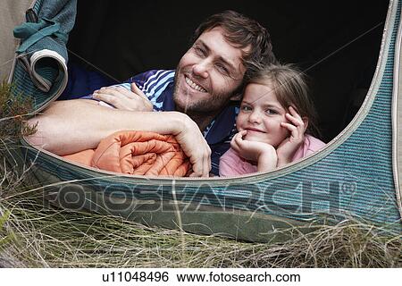 Stock Photograph - Young father with his daughter. Fotosearch
