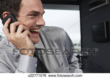 Stock Photograph - Young happy businessman. Fotosearch