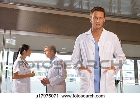 Young happy doctor View Large Photo Image Stock Image - Young happy doctor. Fotosearch