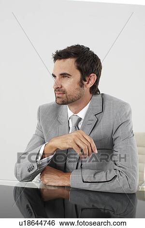 Young man thinking View Large Photo Image Stock Photograph - Young man thinking. Fotosearch
